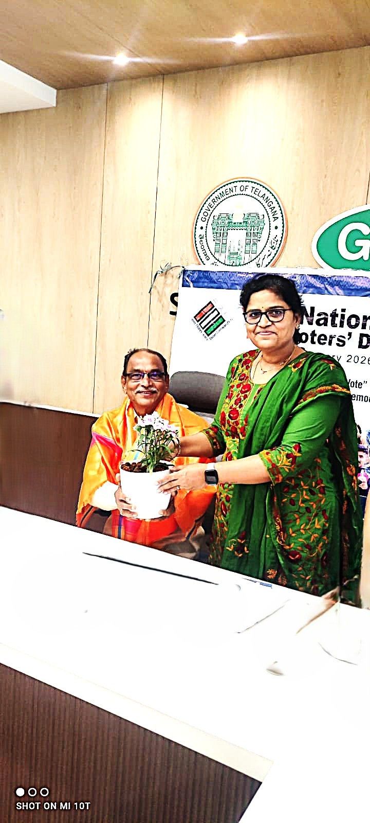 2 The Dy. Commissioner GHMC Zonal office, Serilingampally honouring Dr Jayanth Kumar Garu President of Senior Citizen association.jpeg